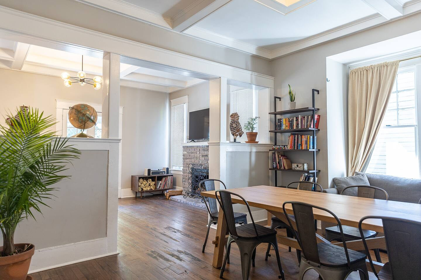 Bright and cozy living space with original character, updated finishes, and plenty of room to unwind. Perfect for movie nights, family time, or relaxing after exploring historic Riverside.