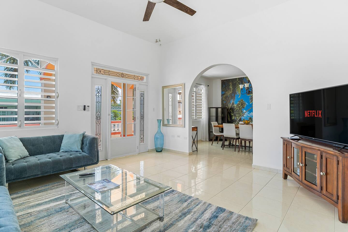 Sunlit open living space with tropical views and relaxing vibes. The perfect spot to unwind after beach days or enjoy a calm morning breeze from the hillside.