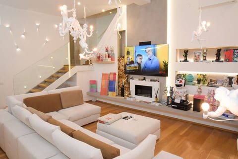 A designer duplex with luxe seating, big windows, and curated décor. Perfect for relaxing after a day exploring Milan’s boutiques, restaurants, and cultural hotspots.