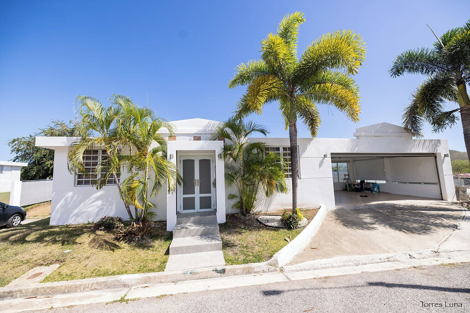 Modern tropical home with private drive, minutes from Coamo Hot Springs.