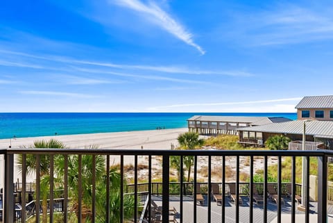 Balcony view facing Pineapple Willy’s & the Gulf next door