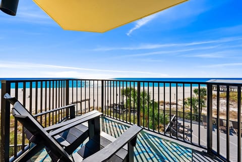 Private balcony with Adirondack chairs & Gulf views