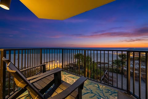 Private balcony sunset views overlooking the Gulf—unwind as the sky lights up over the water.