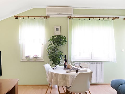 Appartement im Dachgeschoss mit Balkon