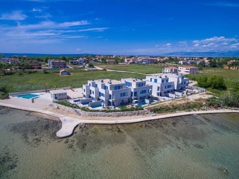 Strandvilla Miri Rose mit beheizbarem Pool