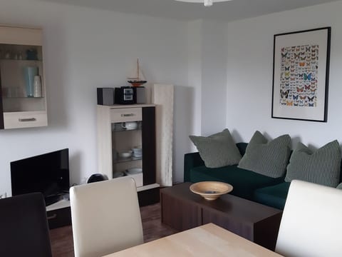 Familienfreundliche Wohnung in Vorland mit Garten