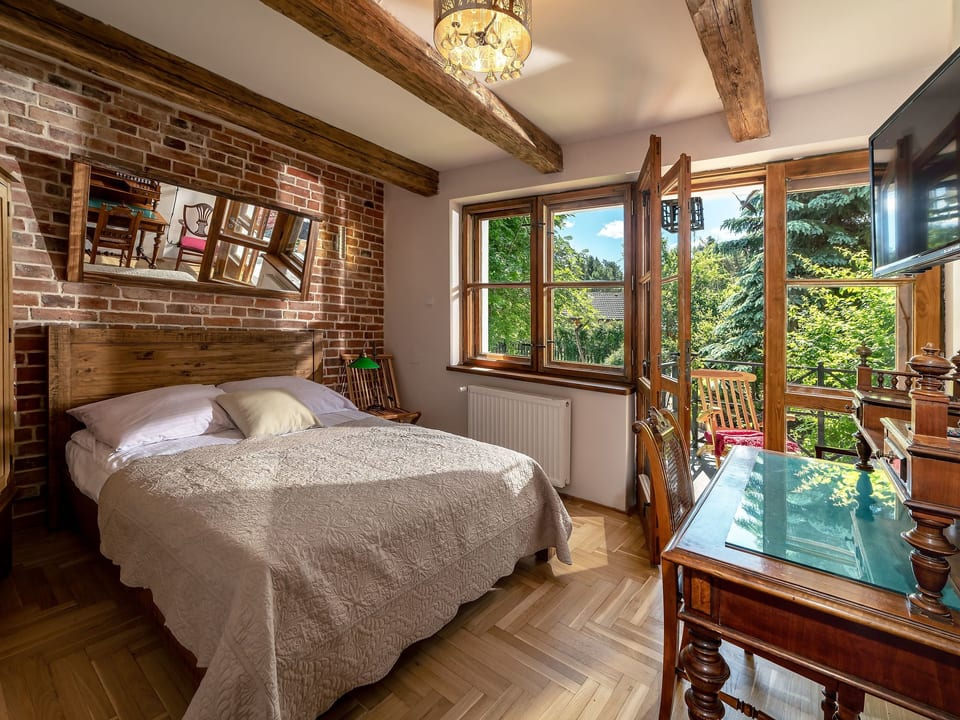 Backsteinwohnung mit Terrasse und Kamin im Erdgeschoss - Ostrowo