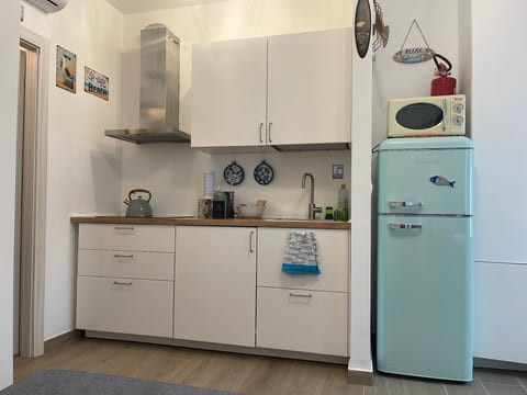 Flacher Strand und Zentrum, Privatparkplatz