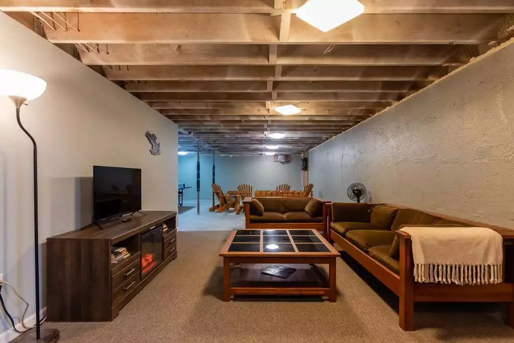 Full basement with ping pong/foosball/ and darts.
Smart TV and fireplace
Games/Cards and books Full basement with ping pong/foosball/ and darts.
Smart TV and fireplace
Games/Cards and books - Private Getaway With Hottub, GamesRoom & Woodstove - Roxbury