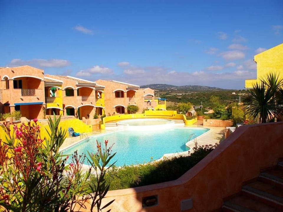 Bel appartement dans une résidence avec piscine - Porto Pozzo