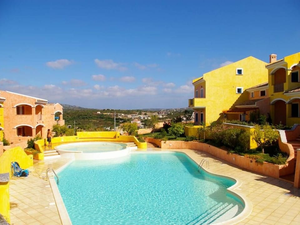 Wohnung 'Zodiac 21' mit Schwimmbad - Porto Pozzo