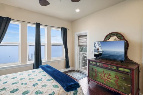 Queen room has access to second floor balcony. Full bath located next to room.