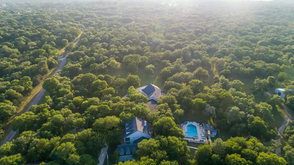 Another aerial shot of the property. - Main House at Whispering Oaks Estate - Dripping Springs