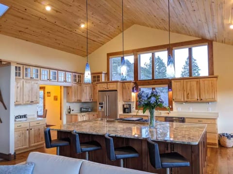 Gather together in the great room w/ a remodeled and fully stocked kitchen