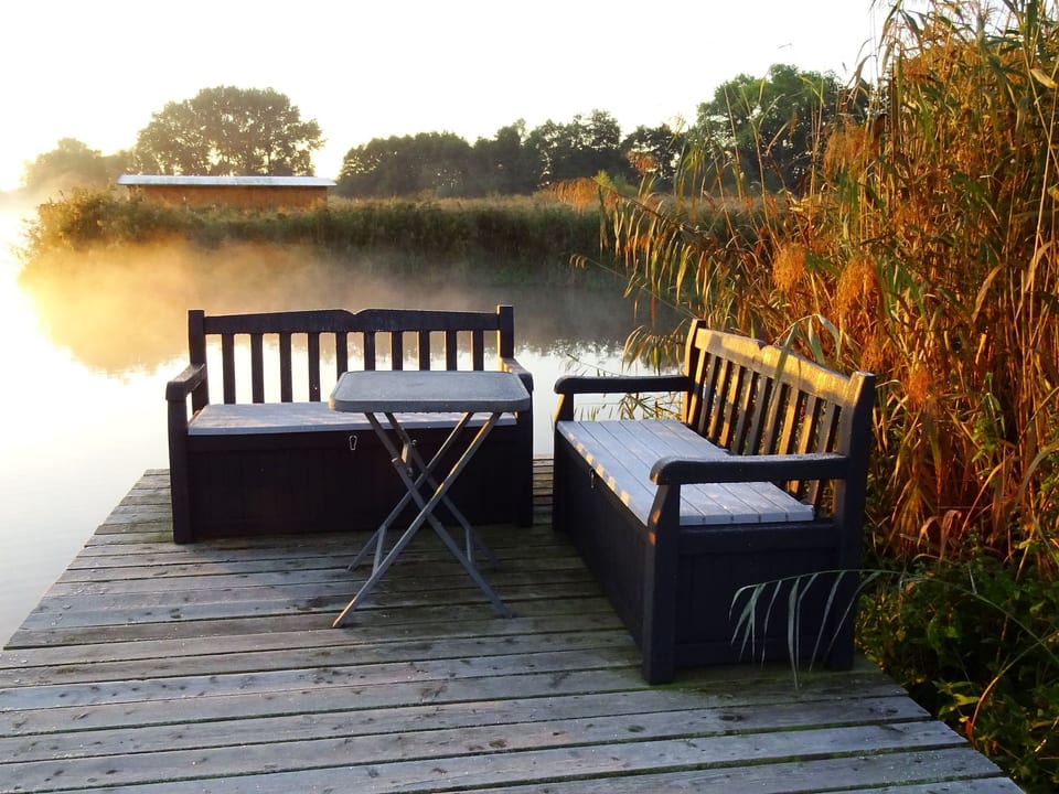 Gemütliches Dachgeschoss-Apartement mit Seeblick und großem Garten am Wasser - Südmüritz