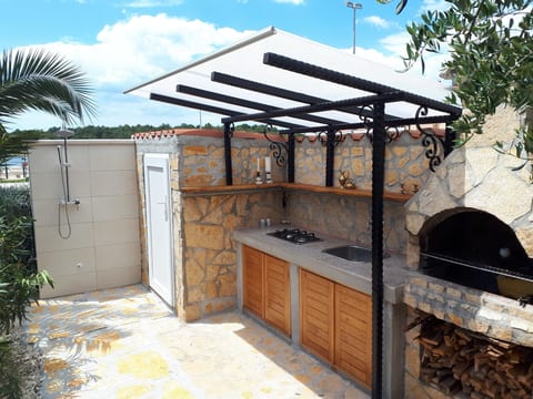 Direkt am Meer liegendes Apartment mit Garten