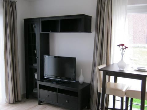 Wohnung im Erdgeschoss mit Terrasse und Stellplatz