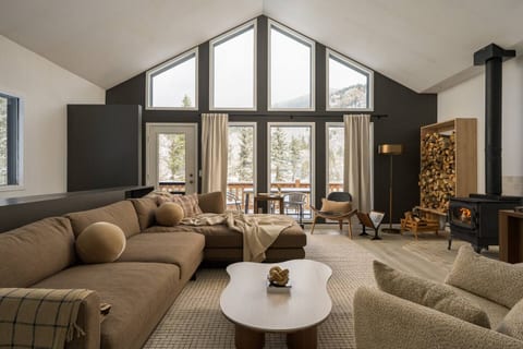 Architectural lines and vaulted ceilings create an airy, expansive atmosphere perfect for slow mornings and deep relaxation.