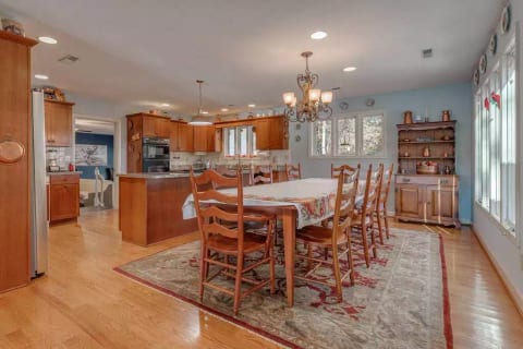 Fully stocked kitchen for cooking and baking, with adjacent billiards room on the main floor