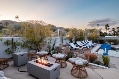 Stay cozy outside even at night with the firepit for the group