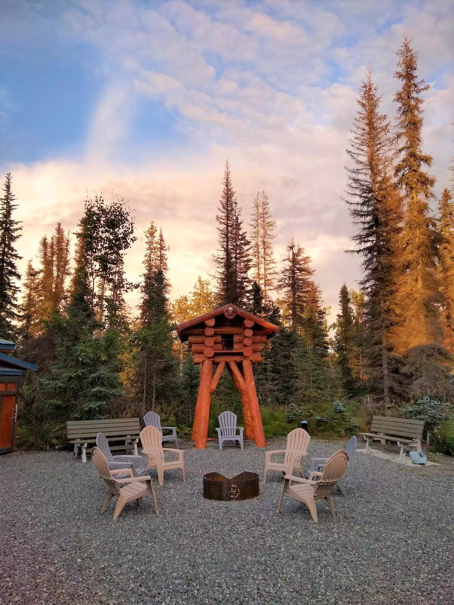 Outdoor seating with firepit.  Benches convert to tables.  