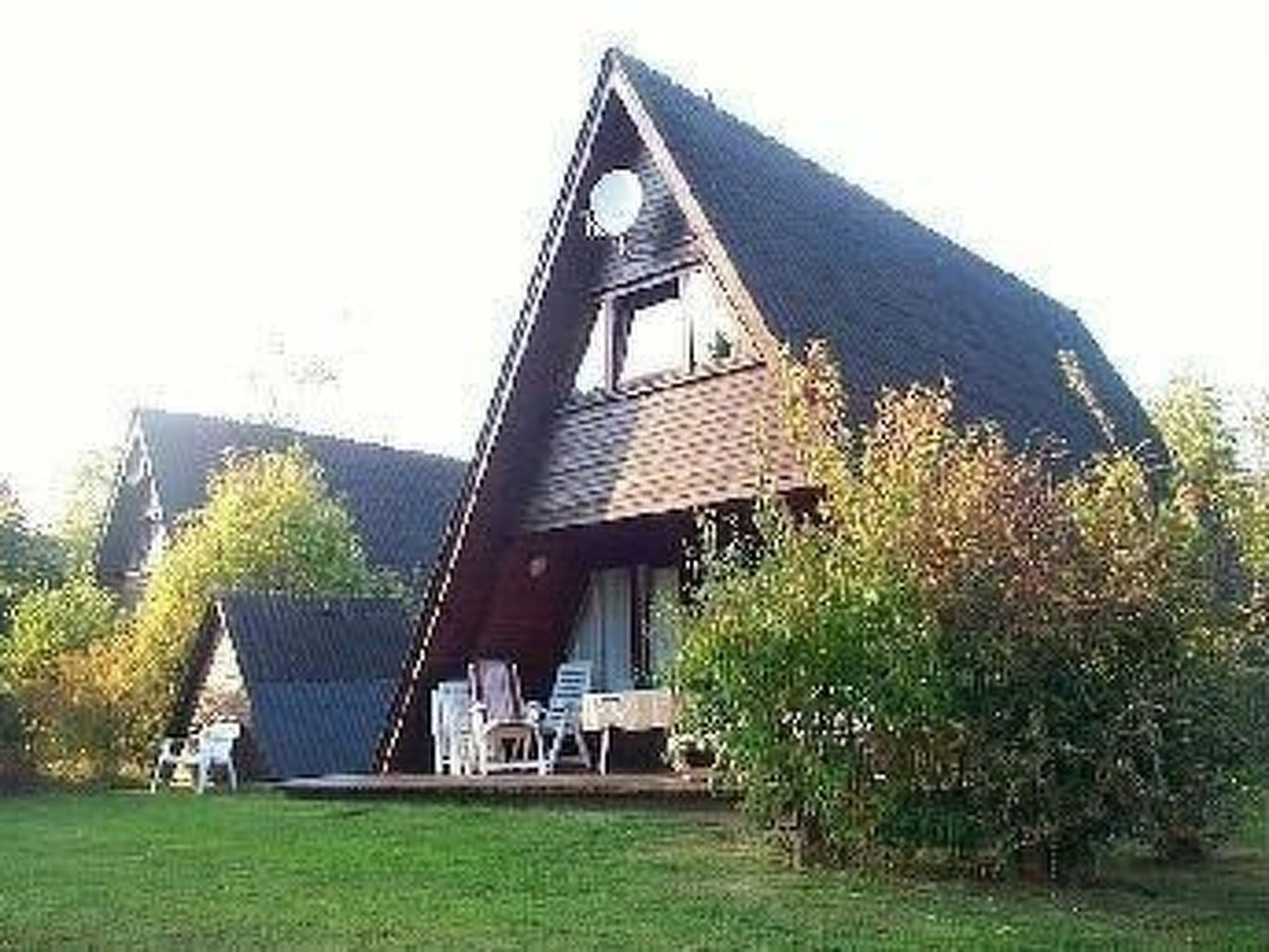 Spitzdachferienhaus mit Schwedenofen und Garten