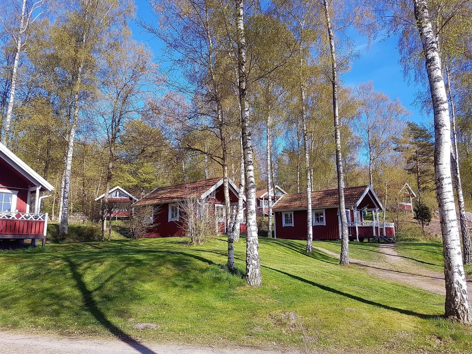 Holzhaus mit überdachter Terrasse - Bräkne-Hoby