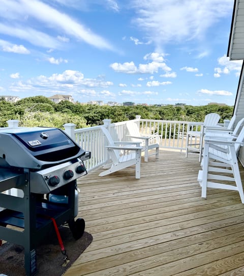 Top deck with gas grill in the afternoon 