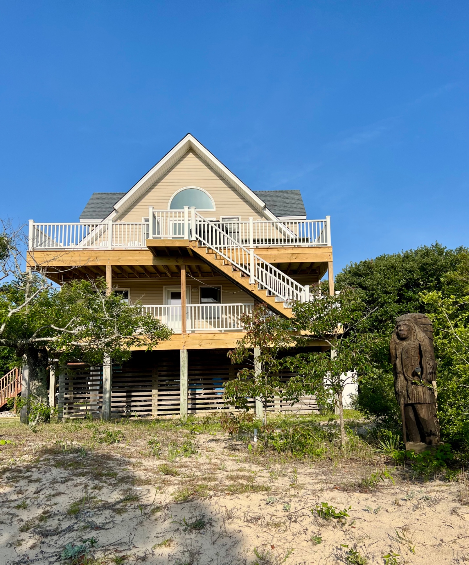 Front of the house facing the ocean with new decks
