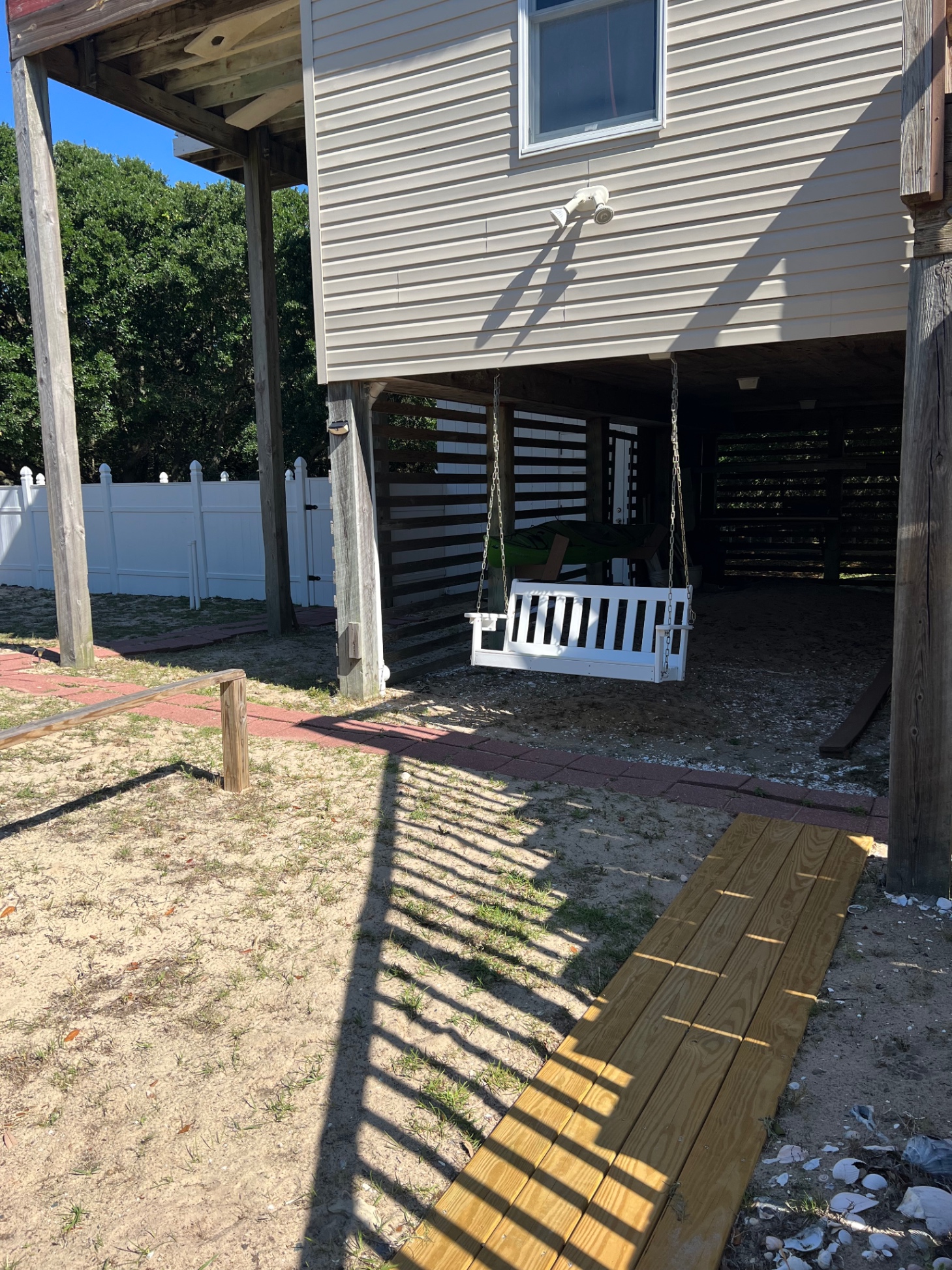 Ground level with bench swing 