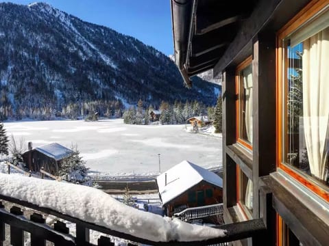Chalet mit Seeblick, Jacuzzi, Sauna und Garten
