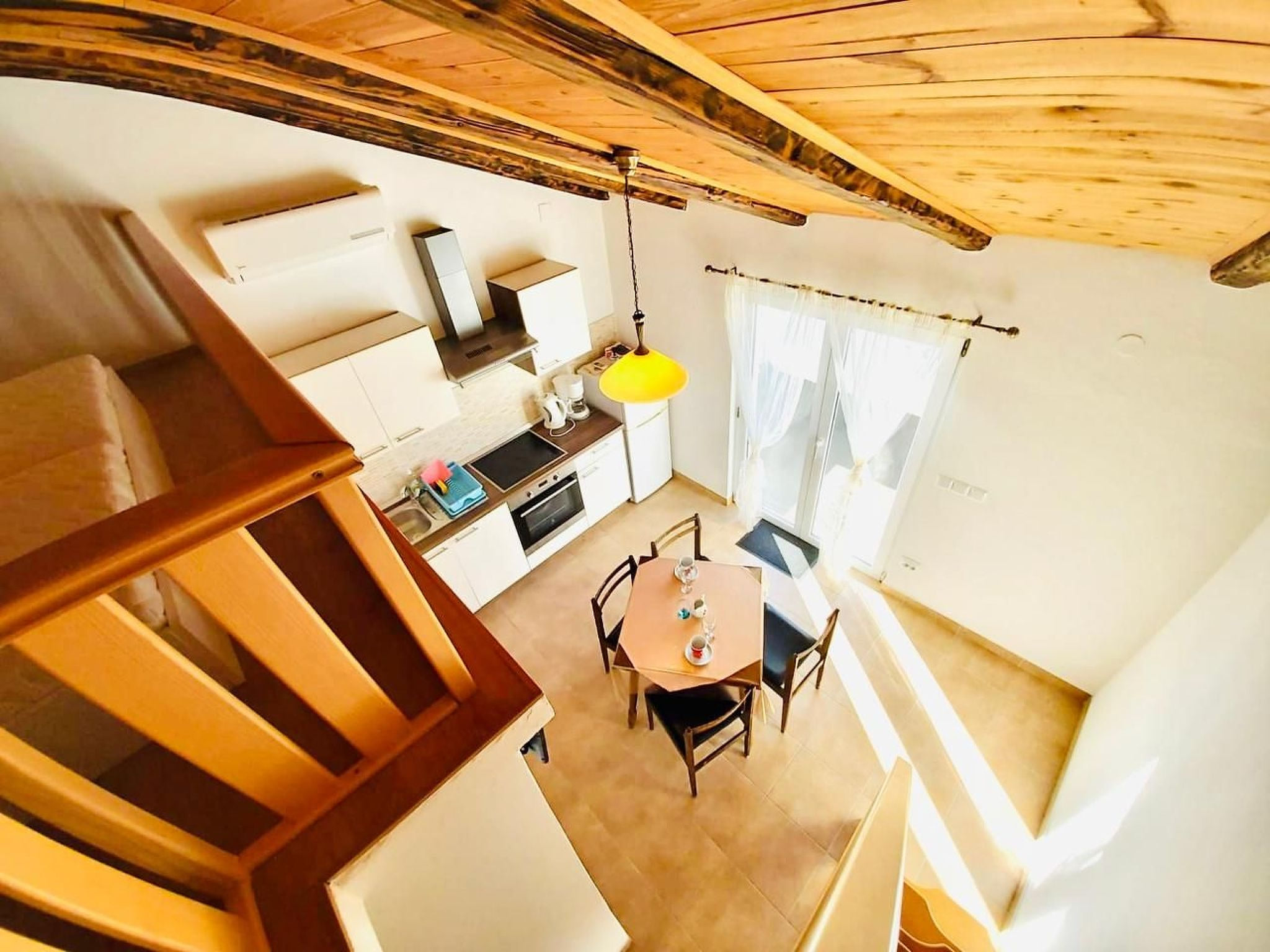 Dachgeschosswohnung auf zwei Etagen mit schönem Meerblick
