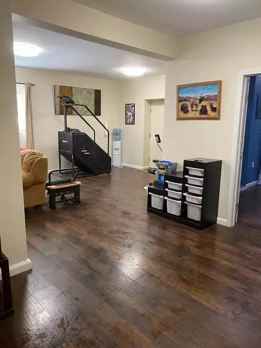 Basement with toy area and exercise equipment - Lake Wallenpaupack Loghome  Heavens Haven hot tub  - Greentown