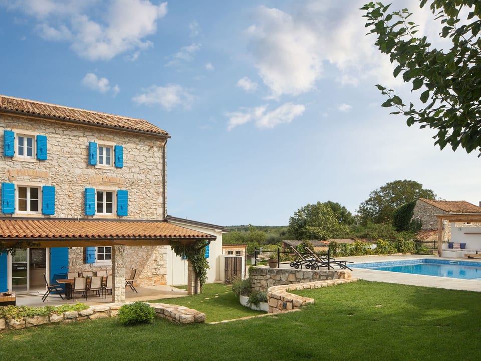 Villa Flavia Maison en pierre traditionnelle avec piscine - Juricani