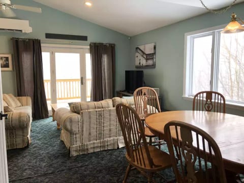 Open concept living and dining room; plenty of seating at the dinner table