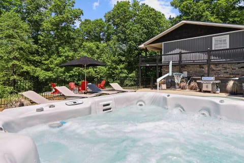 Relax and unwind in the 6 person hot tub.