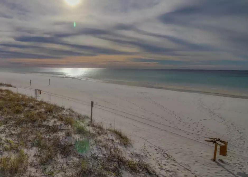 Emerald waters and pristine white sand surround the resort front