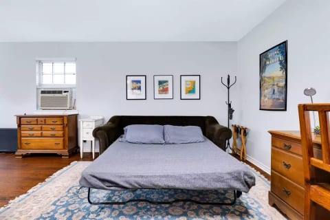 Couch opened to a queen size bed with new mattress