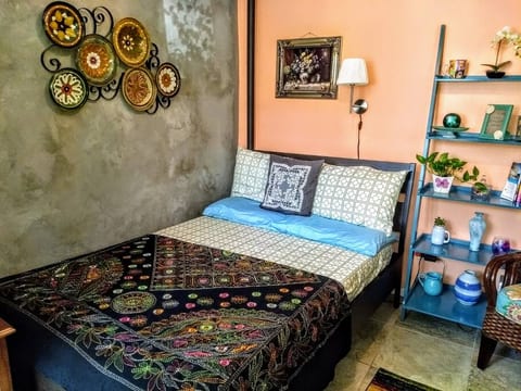 Full bed in the first room.