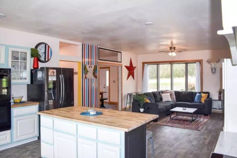 The open concept kitchen / living room makes it so you will never miss the party