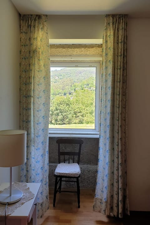 Haus jenseits des Flusses