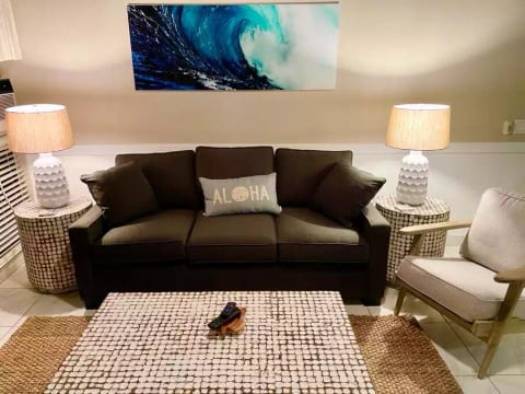 Relax on the couch. If needed this is a sofa sleeper with memory foam mattress.