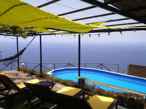 Haus in Arco Da Calheta mit Garten und Meerblick
