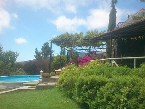 Haus in Arco Da Calheta mit Garten und Meerblick
