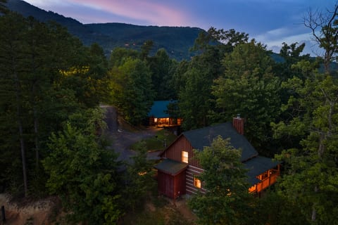 Perched on Bluff Mountain and framed by forest, Nestled Oaks offers a romantic, rustic escape from the everyday.