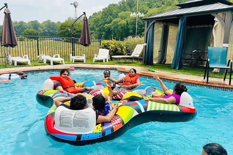 Fun with inflatables on the beautiful salt water pool with whirlpool jets. 