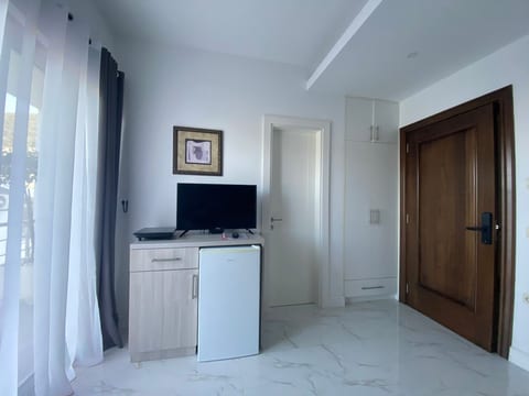 TV, wardrobe & cooking pot