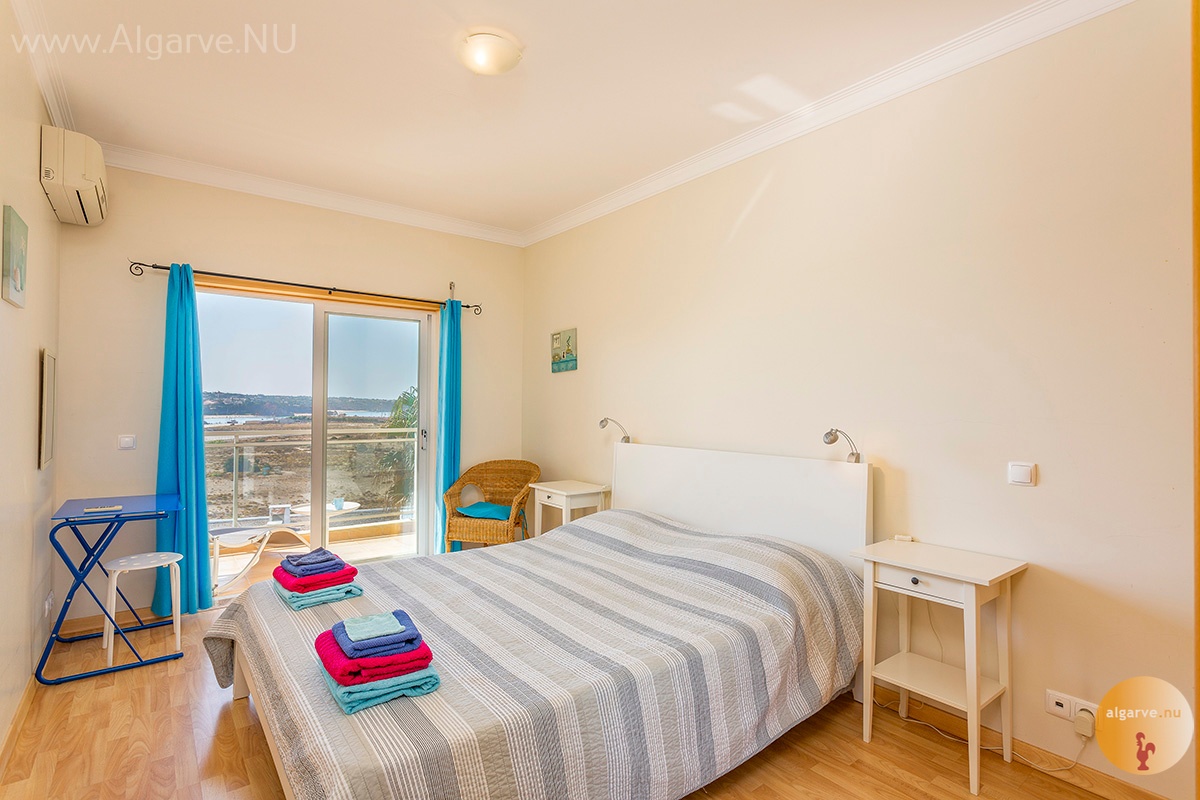 Spaciouw master bedroom with balcony and wide views