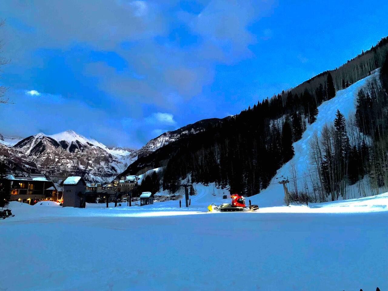 View of snow cat grooming resort from hot tub