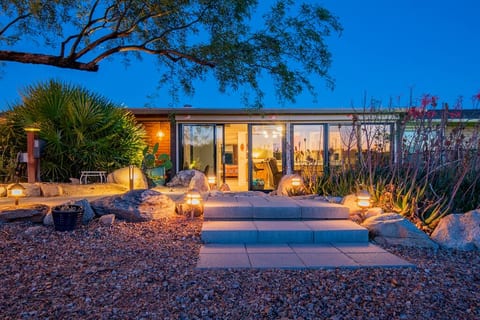 layered native back yard with amazing views inside and out